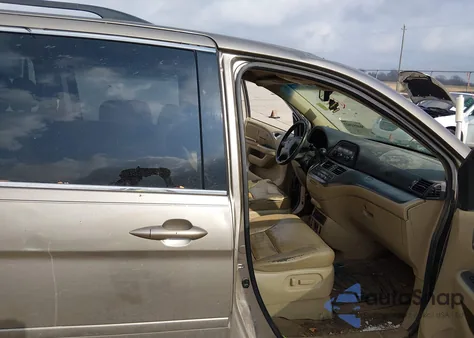 2010 Honda Odyssey Ex-L z USA, uszkodzony, nr VIN 5FNRL3H79AB090849